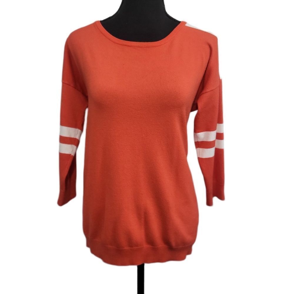 Sporty light weight orange and white sweater cable and gauge